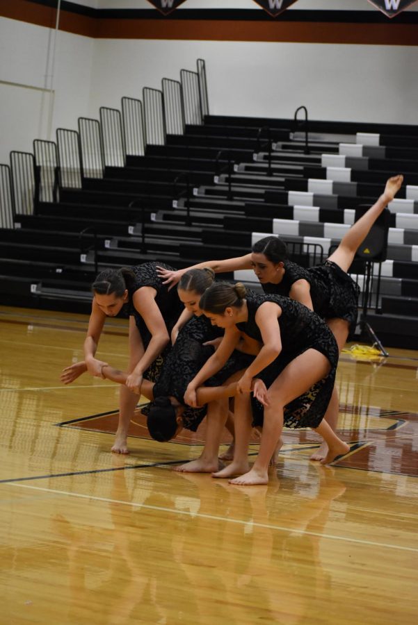 The officers perform modern choreography.