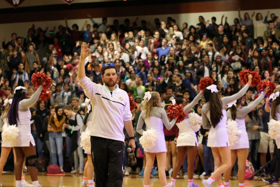 ______ sings the _____ with the student body.