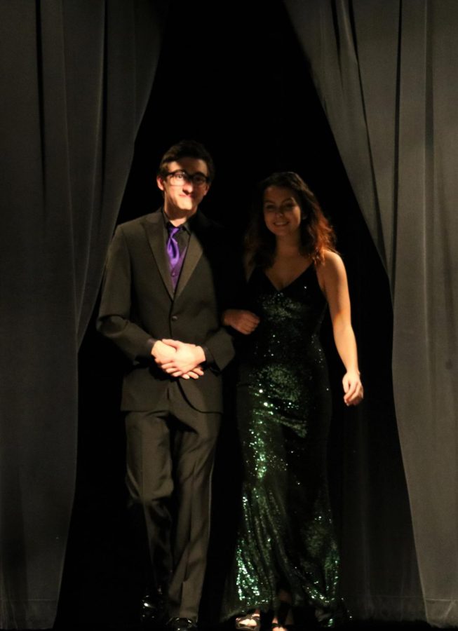 Juniors Colten Roberts and Sarah Hendler enter the stage.