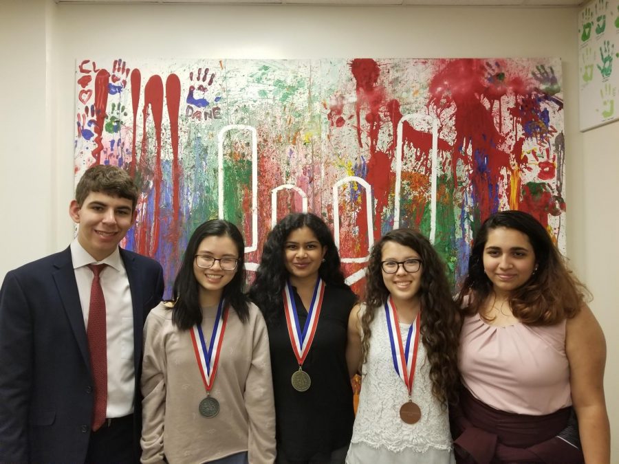 Max Wolf 19, Emily Gao 19, Anurima Mummaneni 20, Linette Page 19, and Sanju Dubey 20 pose together after competing. Photo courtesy of WHS Speech and Debate.