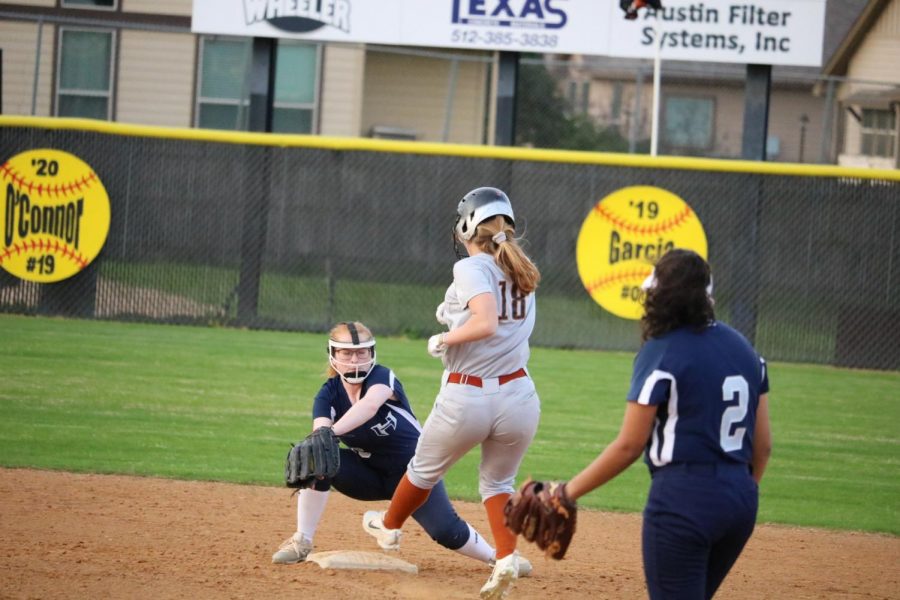 Lauryn Tyndall makes it safely to second base. 
