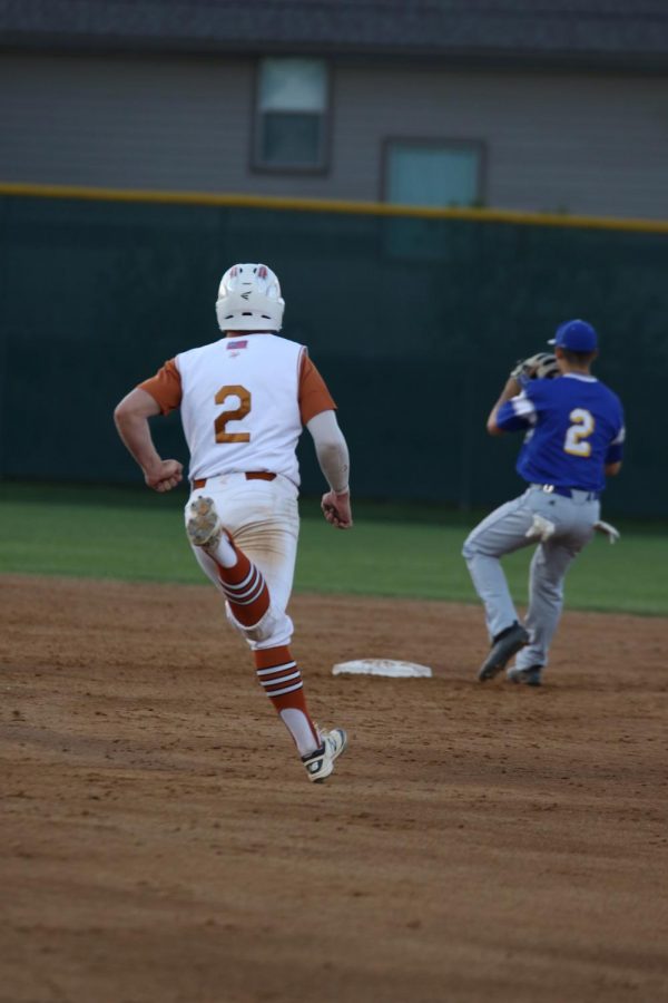 Reed Harrington 18 runs from first base to second against Pflugerville. 
