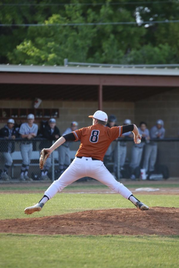 Kyle Clements 19 pitches the ball against Cedar Ridge