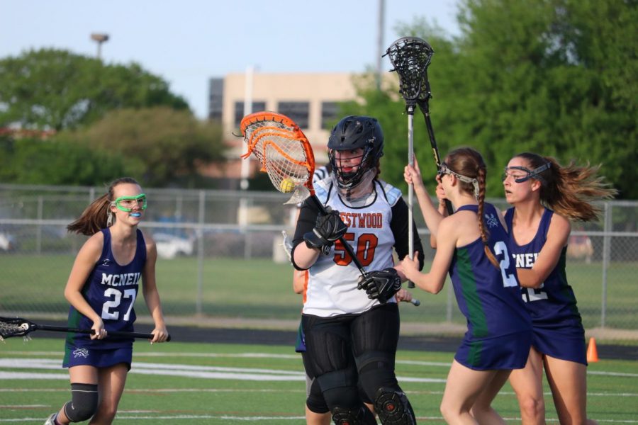Goalie Catherine Wiesehuegel 19 looks for an open teammate to throw the ball to. 