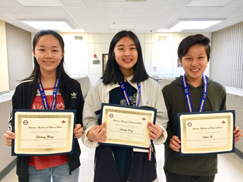 Sophomores Sandra Cong, Sophia Li, and Alena Zhang pose with their certificates. Photo courtesy of Ms. Anne Macharia.