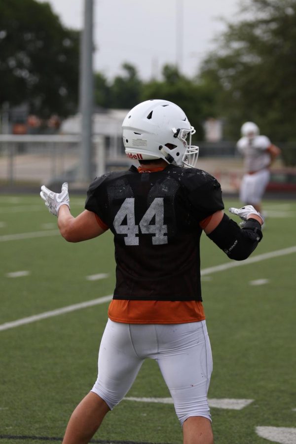 Will Clithroe 19 yells in celebration at a defensive success during the early morning scrimmage. 
