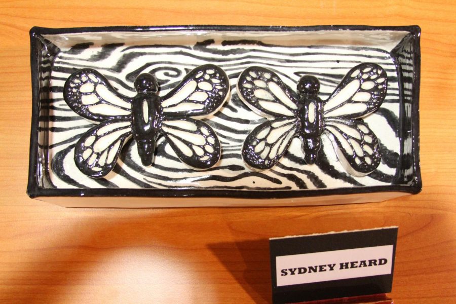 Sydney Heards 18 ceramic piece is displayed.