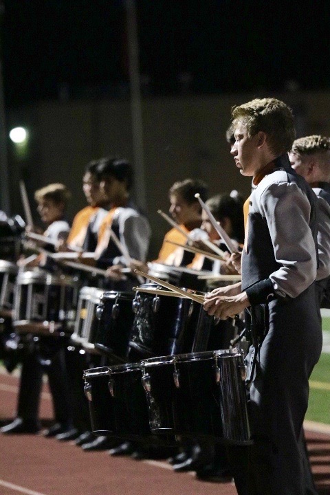 Aidan Wassmuth 20 performs during drum-line. 