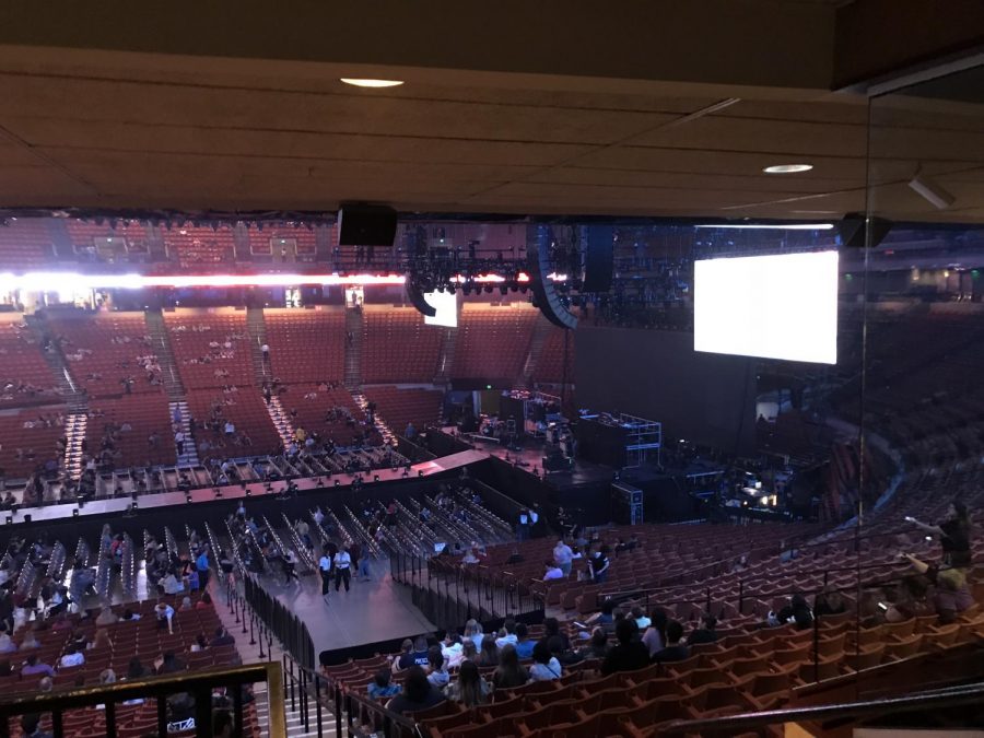 Fans take their seats before the concert begins. 