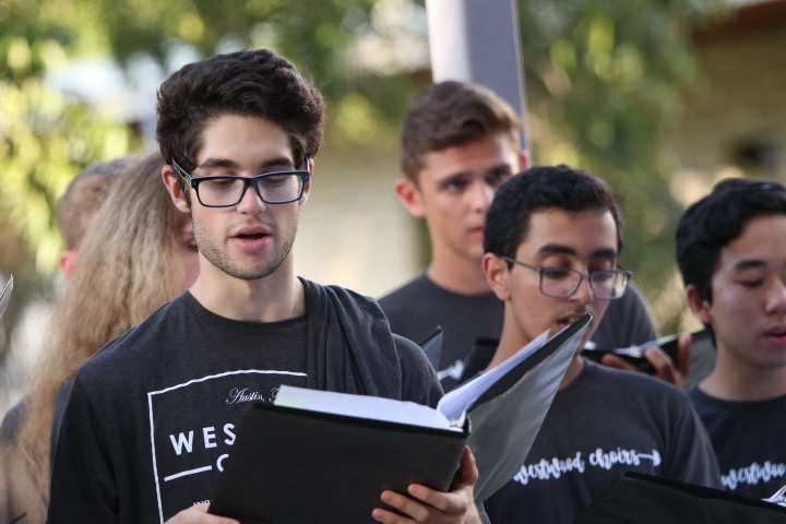 Rehearsing his music, Lucian Tripon 21 sings outside with Chamber Choir. 