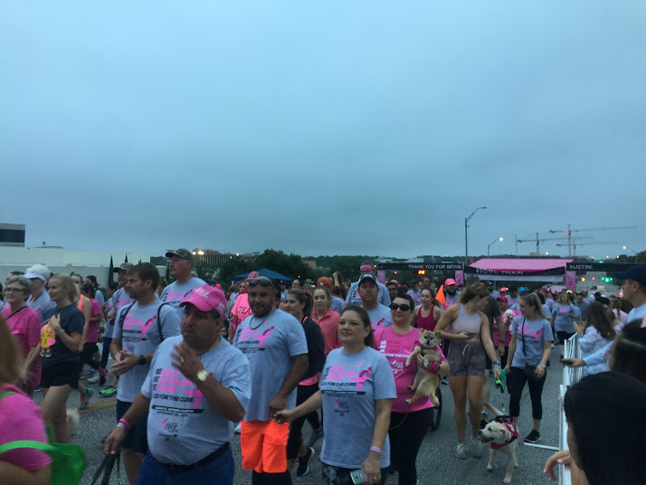 The runners begin their 5k marathon in support of breast cancer awareness.