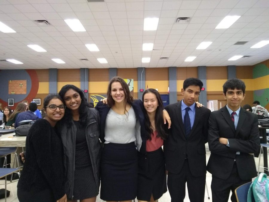 Debate students pose for a picture. Photo courtesy of WHS Debate.