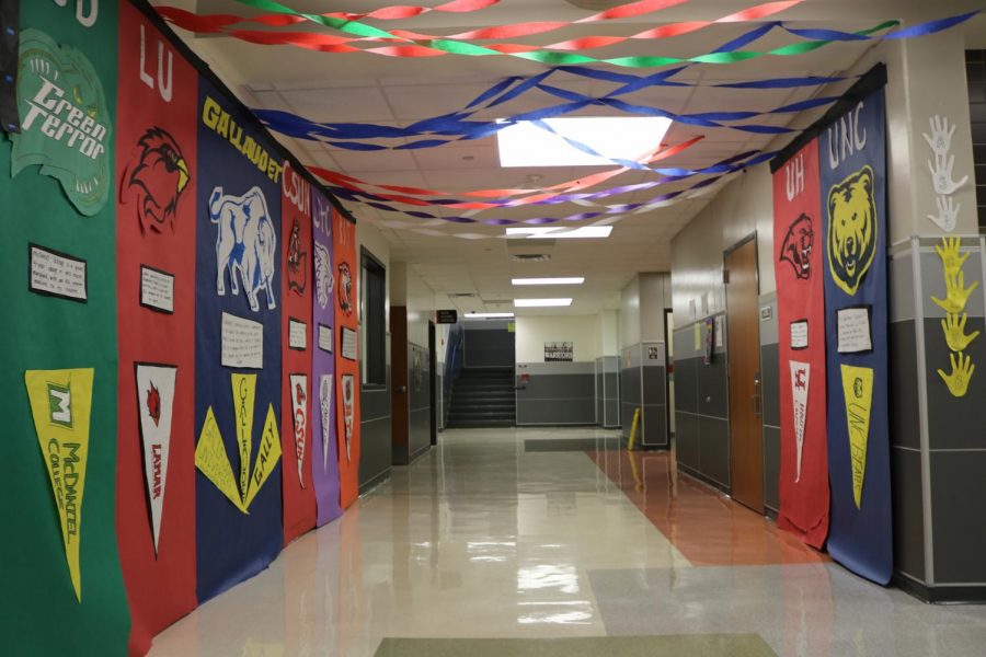 ASL club decorates their hallway on different colleges with ASL majors.