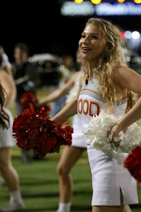 During the third quarter, Lily Baizer 20 dances during drum chants.