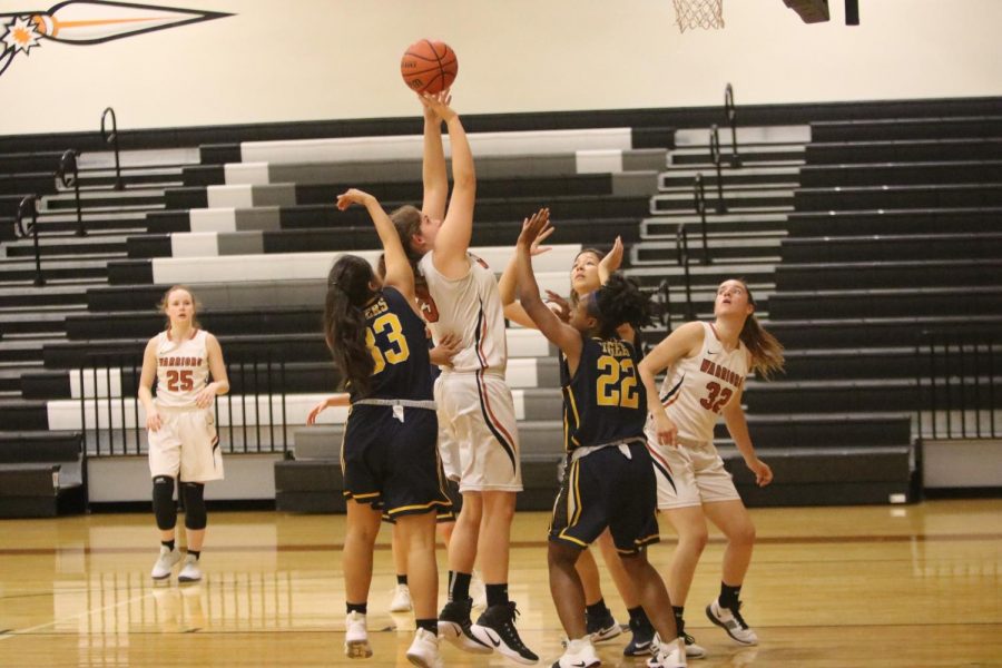 Emma Zion 21 shoots for the basket. 