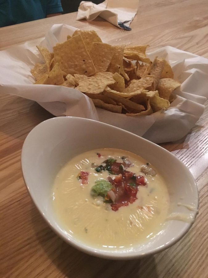 Kerbery Lanes award winning Kerbey Queso with a side of chips.