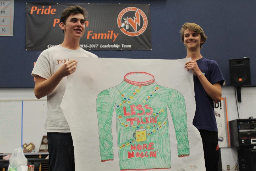 Sophomores Liam Benner and Adam Perry present their sweater design.