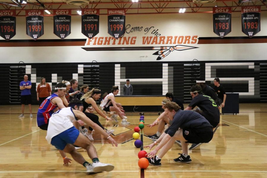 Students race to grab ammunition before the other team can.