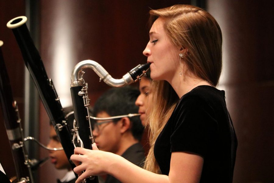 Natasha Sturdevant 22 maintains concentration while playing the bass clarinet. 
