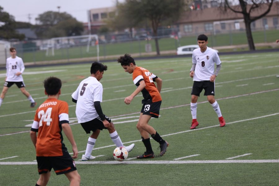 Yash Kakkad ‘21 makes quick work of a Round Rock defender.