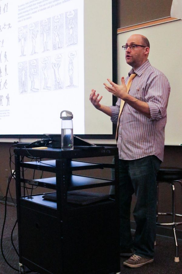 Gregg Schigiel presents on animation and cartoon creation. 