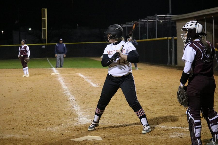 Eileigh Whyte 21 practices her swing on home base. 