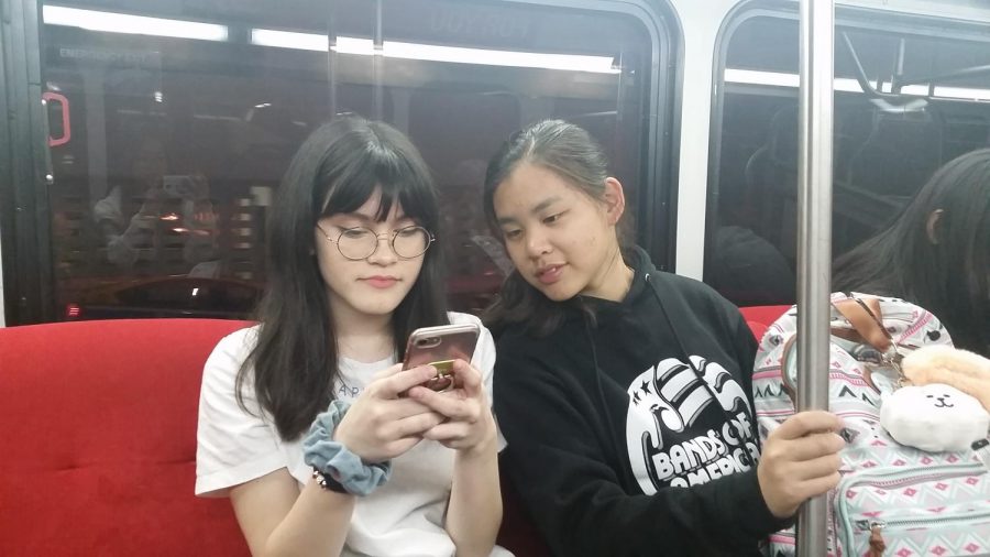 Victoria Chandler 20 and Michelle Huang 19 ride the bus in Los Angeles. 
