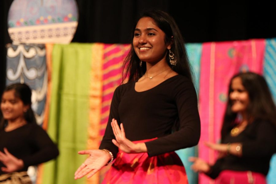 Madhuri Neralla 19 dances to an upbeat Bollywood song in her performance.