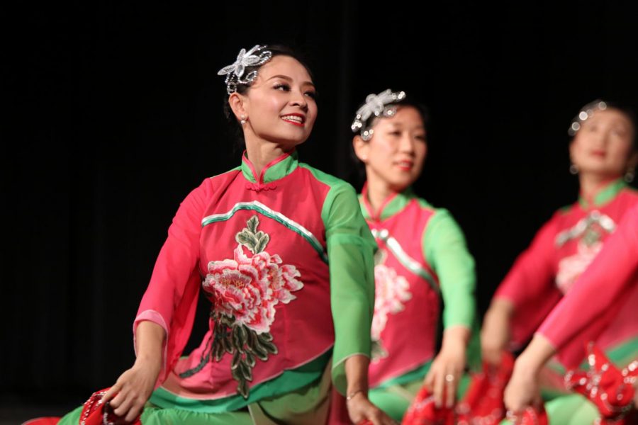 The performer smiles during her Chinese dance.