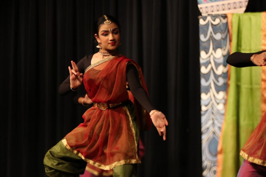 The dancers tell the story of Shiva, a Hindu deity, in their traditional Bharatanatyam performance.