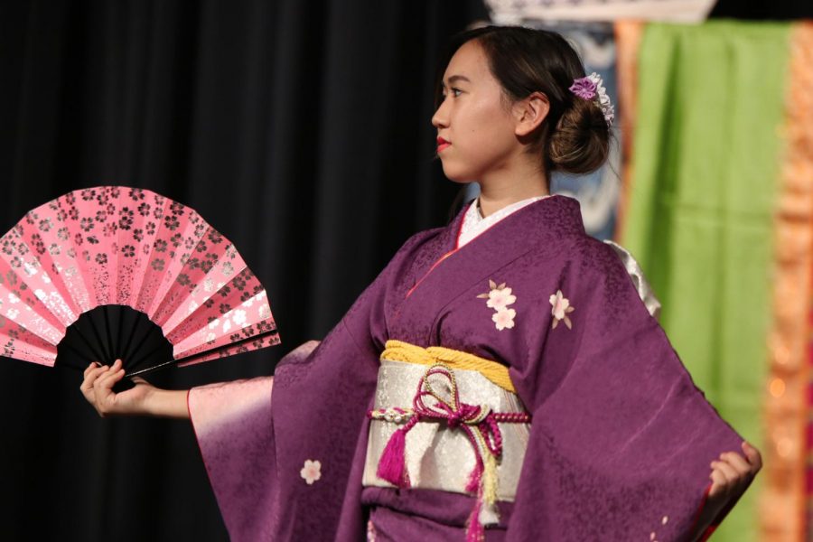 A student sports her kimono in the fashion show.