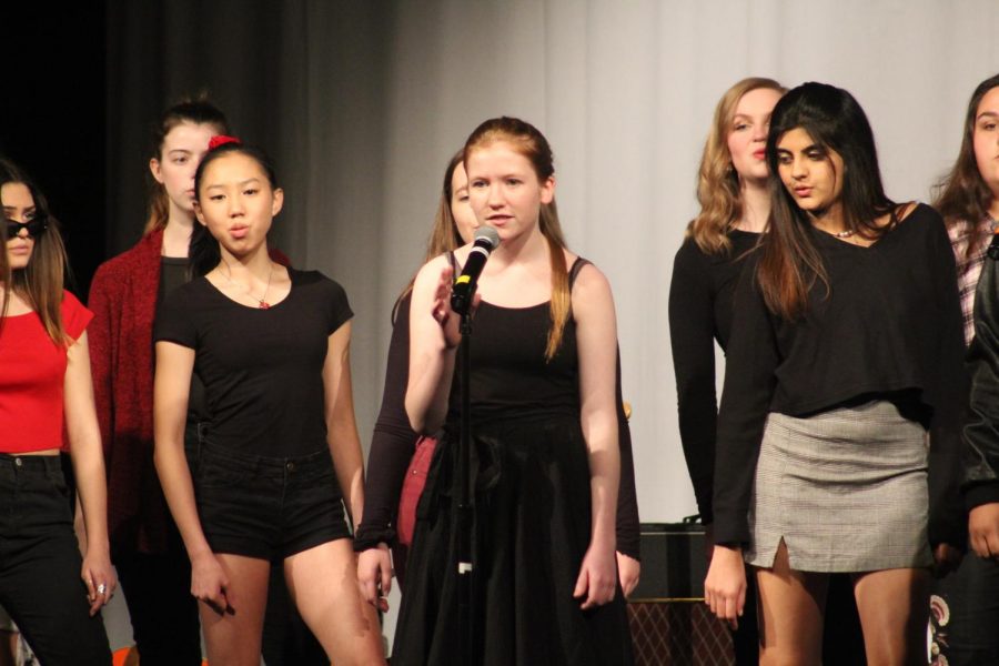 Violet Burns 21 sings a solo during the Varsity Womens song Black Horse and The Cherry Tree by KT Tunstall.