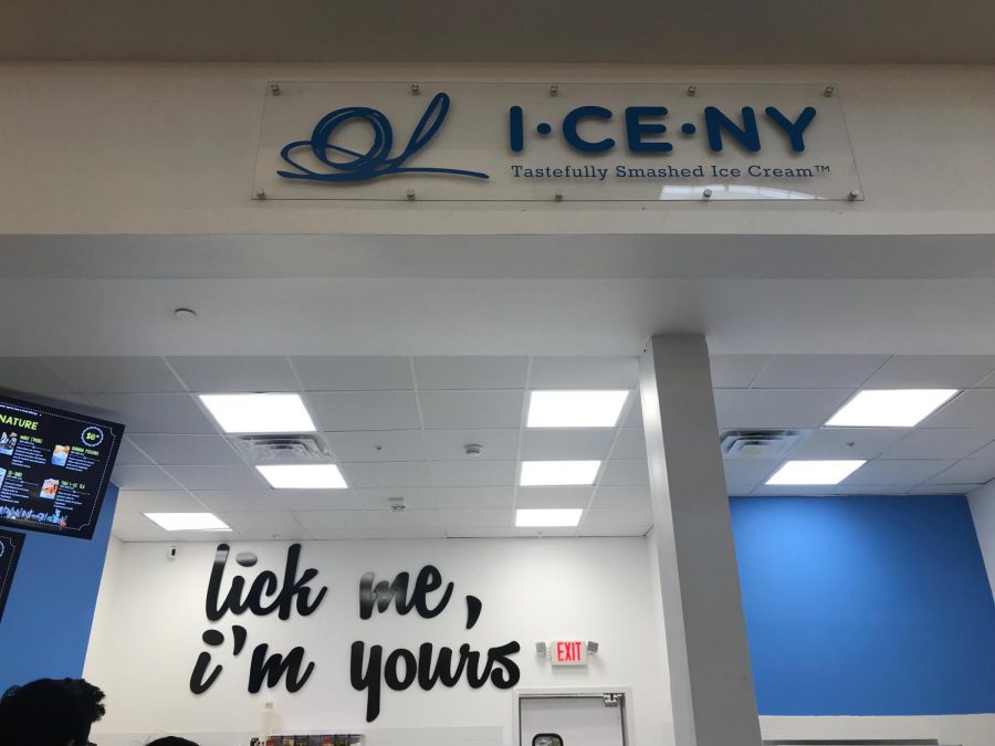 The outside of the shop features a sign of I-CE-NY and its slogan, Lick me, Im yours.