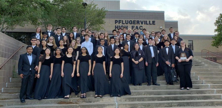 Wind Symphony celebrates after UIL outside of the performance hall.