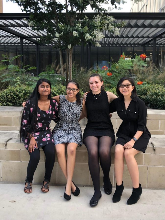 Students Linsy Stephen 22, Srilekha Cherukuvada 21, Abigail Dewhirst 21, and Emily Tran 21 pose for a picture outside of the music building after performing.