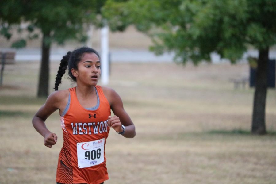 Deepti Choudhury '21 places 7th in the 6A girls race. Choudhury went out with the top pack, and held on to finish the 5K in 18 minutes and 20 seconds.