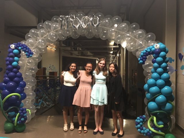 Under a festive Under the Sea balloon arch, Aakanksha Mahajan 23, Catharine Li 23, Irina Raleigh 22, and Irene Lu 23 pose for a picture. 