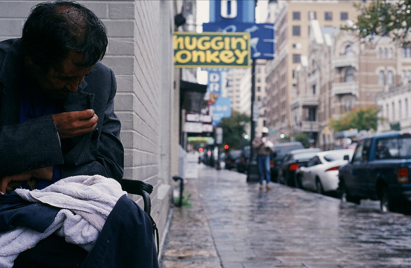 A homeless man sits outside the Chuggin Monkey bar in downtown Austin. The homeless population of Austin has been steadily rising over the last few years, keeping hundreds out of shelters and on the streets.