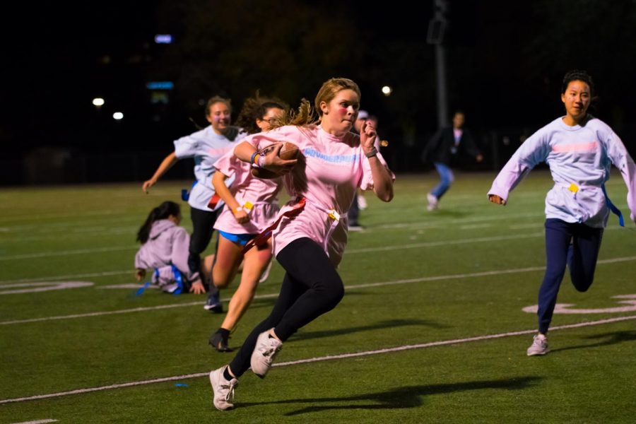 Greta Mock 22 sprints upfield with the ball. Mock went on to score the last touchdown which brought the score to 35-14.