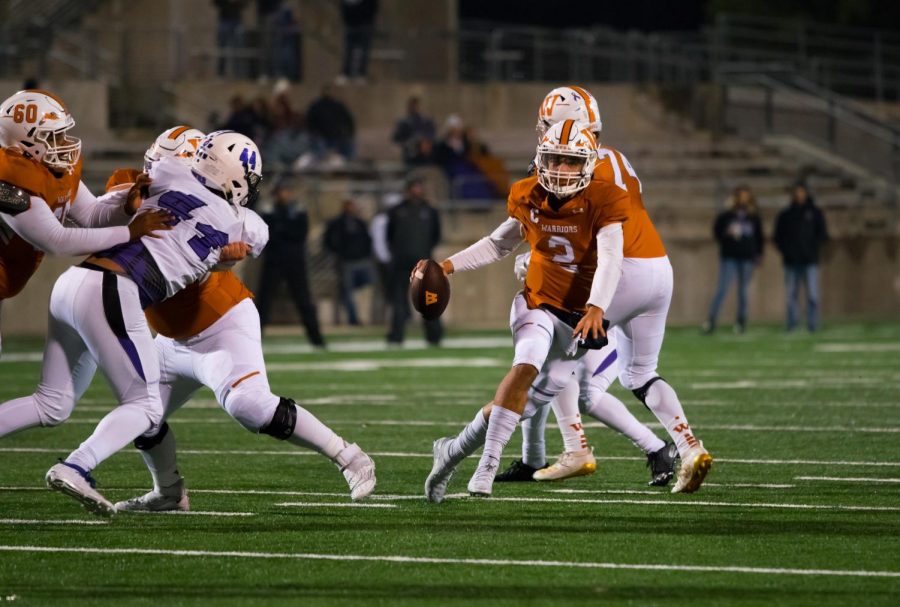 Running with the ball, RJ Martinez 21 looks to make a pass. The pass intended for wide receiver Joseph Kubelka 20 ended up incomplete.