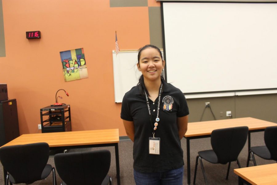 Erica Yao 21, Governing Team member of the STEM academy, smiles after a successful 8th grade day.  All the presentations ran smoothly since the 8th graders sat quietly and listened.