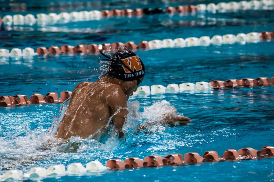 Benjamin Truong 21 goes up for air in the 100 meter Breaststroke. Truong ended up placing second in his heat. 