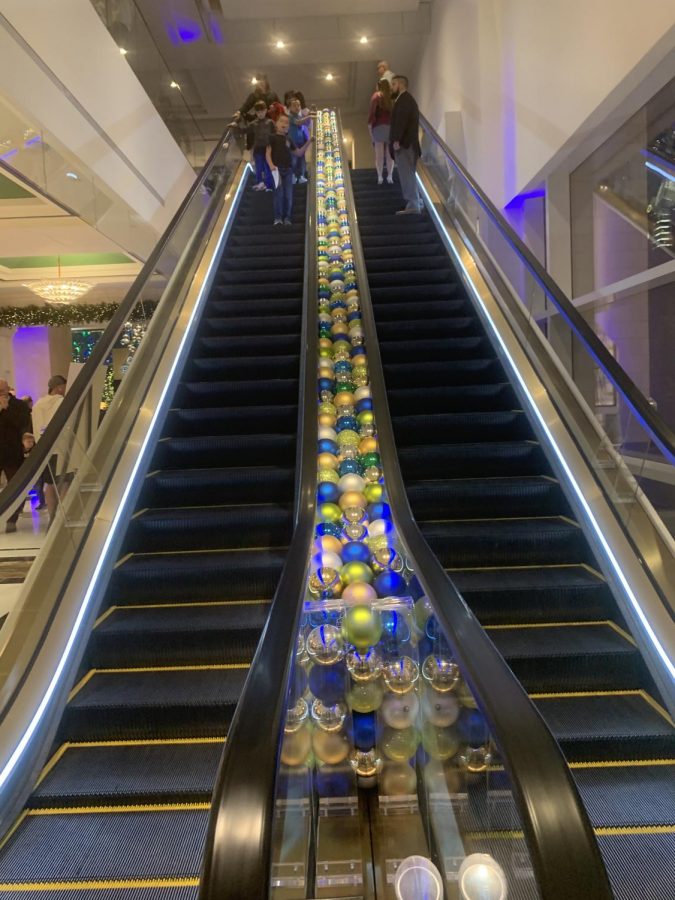 The escalator was stuffed with hundreds of ornaments to add another holiday touch to the already festive hotel.  Customers enjoyed viewing these ornaments as they waited to go up or down to the next floor.
