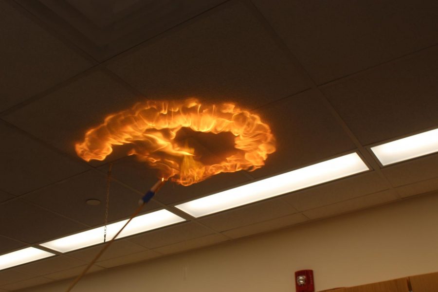 A methane bubble is lit right before it hits the ceiling and creates a dispersed flame.