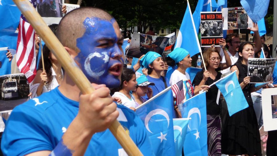 Protesters hold a rally outside the White House against Chinas treatment of Uighurs on July 10, 2009. Five days earlier, hundreds of Uighurs led riots in Xinjiang, China that quickly escalated into violence.