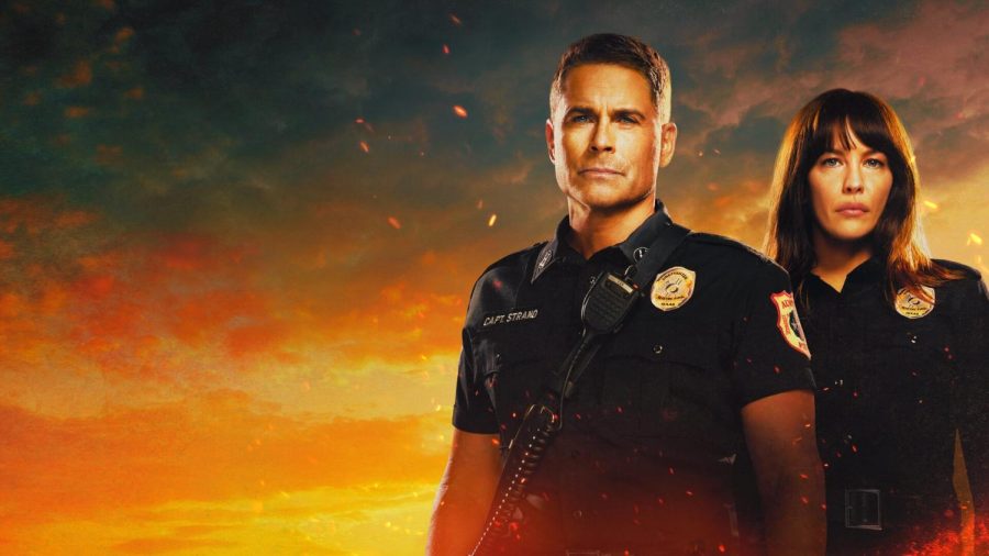The two main characters of the show pose on a poster for 9-1-1 Lone Star in their police uniforms.