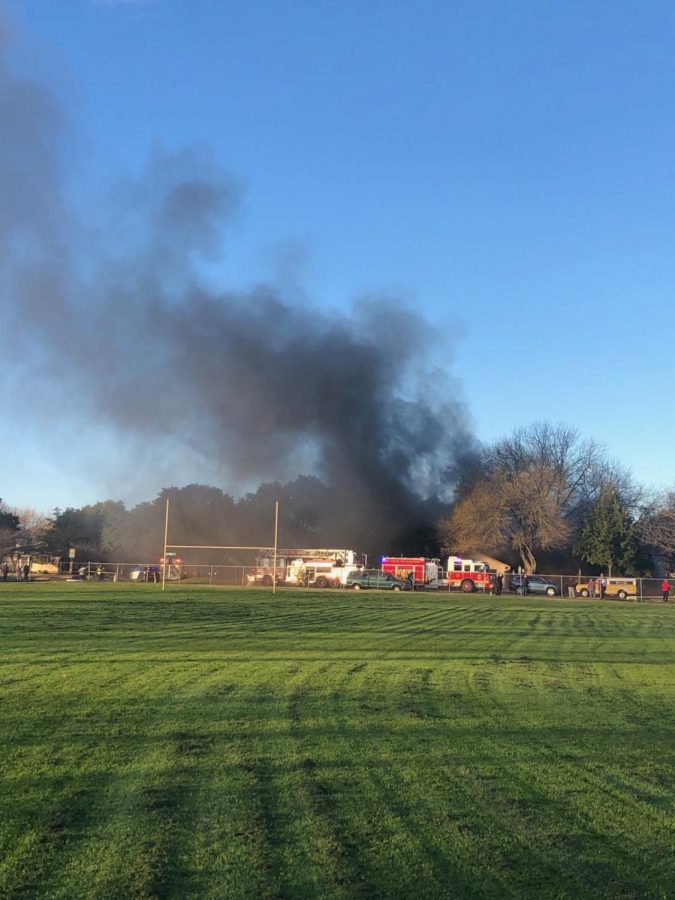 The fire on Schoolhouse Lane created a haze that could be seen and smelled from hundreds of yards away. Photo Courtesy of Mary Miller 20.