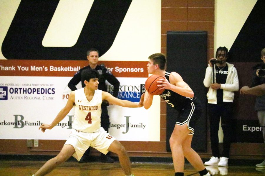 Arjun Seth 21 goes face to face with an opposing Viper. Seth was able to hit a three late in the fourth quarter to cut Vandegrifts lead to one.