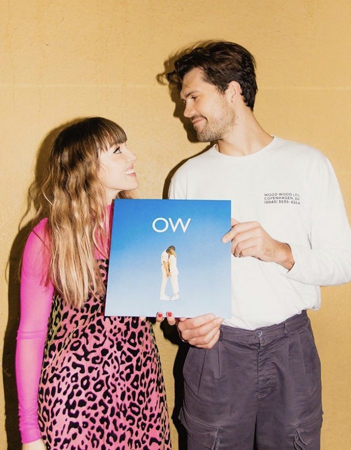 Josephine Vander Gucht and Anthony West pose for a picture with their new album. This is their third studio album together. Photo Courtesy of @ohwondermusic.