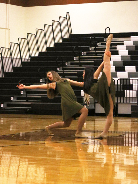 Freshmen Thessa Greebe and Nikki Frazier shock the audience with their pose. Their performance won 1st place for Junior Duets, making them the only Warrior Pride duet to win a trophy. 